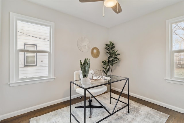 office area with dark hardwood / wood-style flooring and ceiling fan