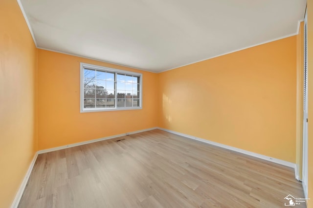 empty room featuring light hardwood / wood-style flooring