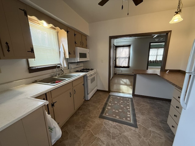 kitchen featuring pendant lighting, a baseboard radiator, sink, ceiling fan, and white appliances