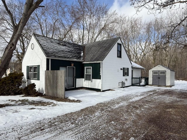 view of front facade featuring a storage unit