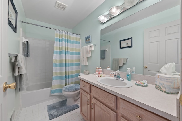 full bathroom featuring vanity, shower / tub combo with curtain, tile patterned floors, and toilet