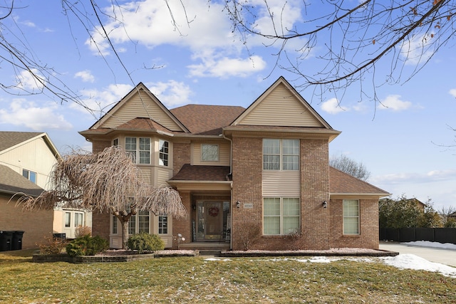 view of front property featuring a front lawn