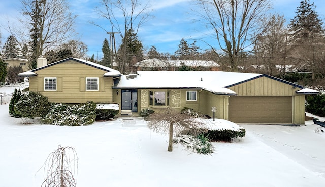 view of front of home with a garage