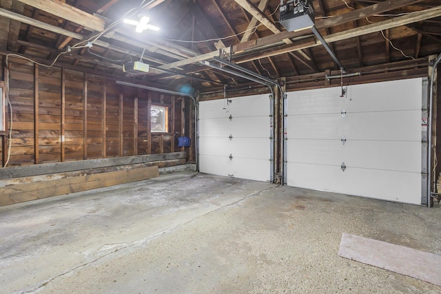 garage featuring a garage door opener