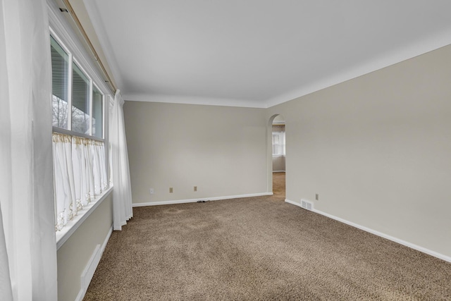 unfurnished room with carpet flooring