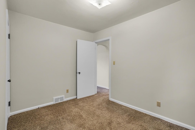 view of carpeted spare room