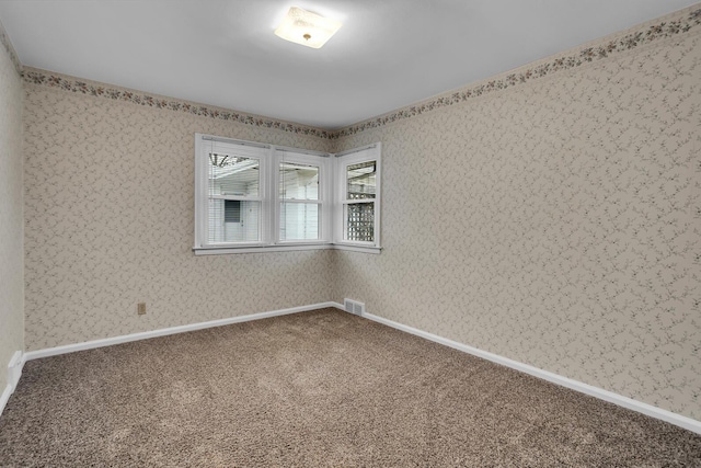 empty room featuring carpet