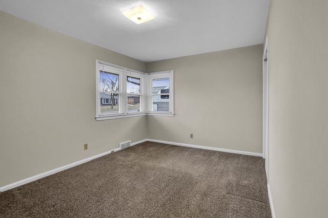 empty room with carpet floors