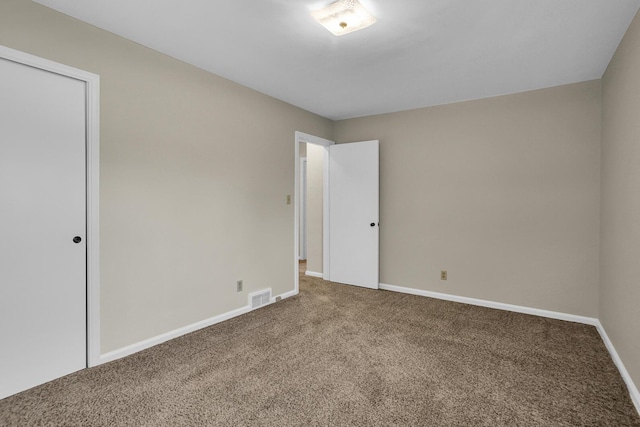 unfurnished bedroom with carpet