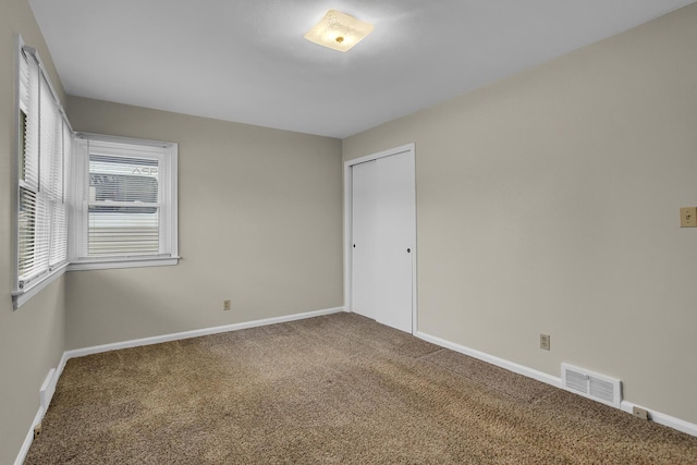 view of carpeted spare room