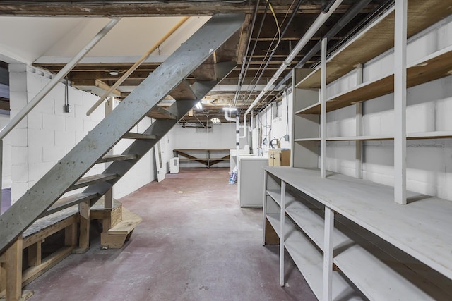 basement with washing machine and clothes dryer