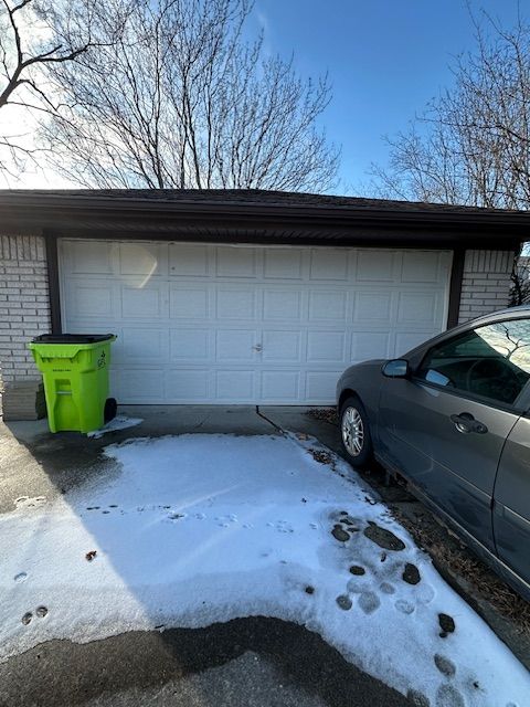 view of snow covered garage