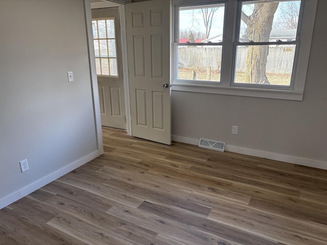 interior space with hardwood / wood-style flooring