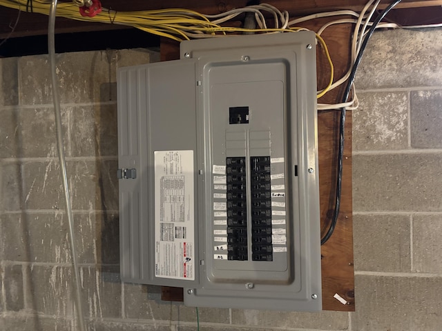 utility room featuring electric panel