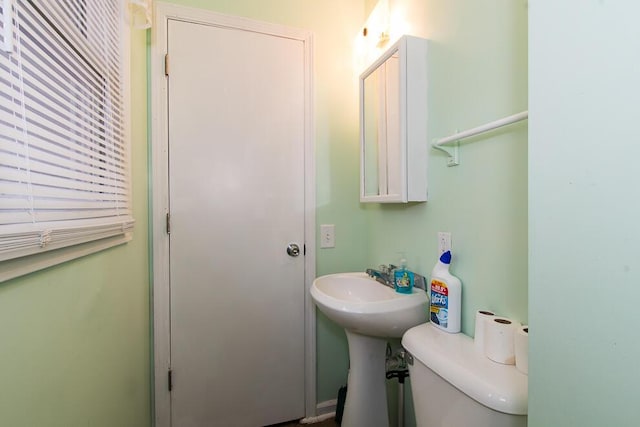 bathroom featuring toilet