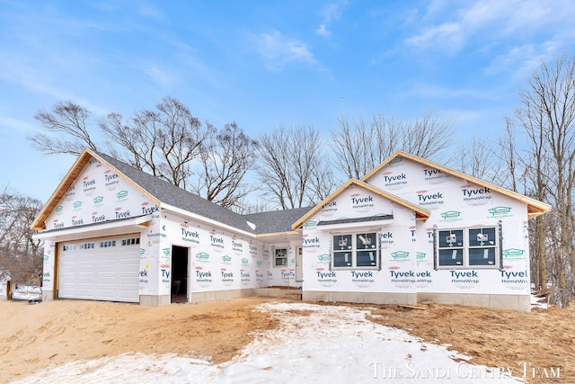 property under construction with a garage