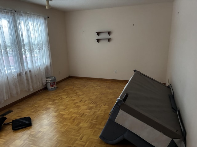 spare room with light parquet flooring