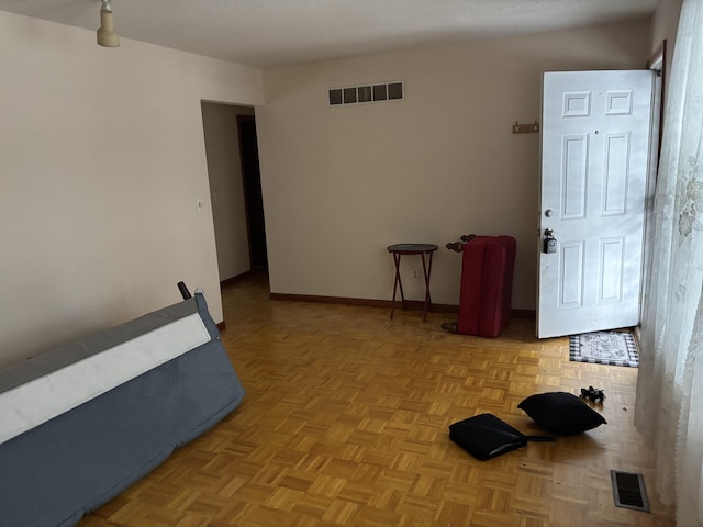 interior space with light parquet floors