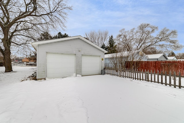 view of snow covered garage