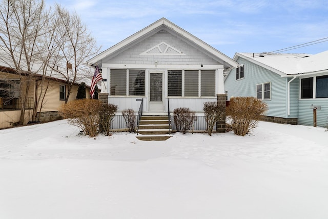 view of snow covered house