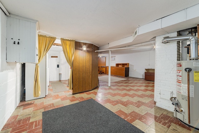 basement featuring gas water heater