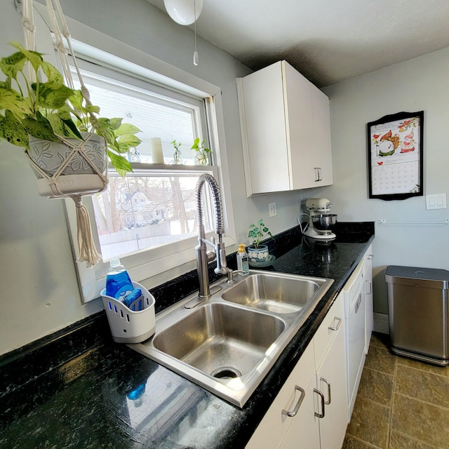 kitchen with sink and white cabinets