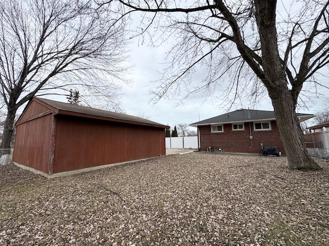 exterior space featuring an outbuilding