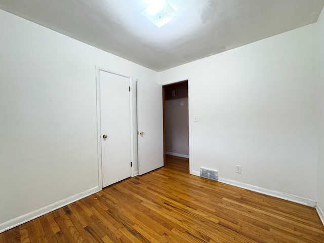 empty room featuring light hardwood / wood-style floors