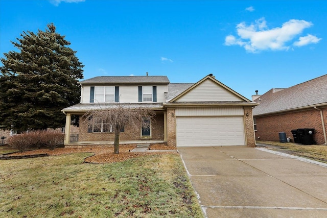 view of front of property with a garage and a front yard