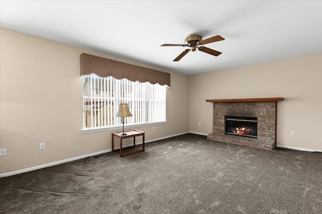 unfurnished living room featuring a brick fireplace, carpet floors, and ceiling fan