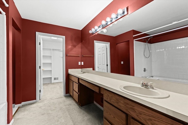 bathroom featuring vanity and bathing tub / shower combination