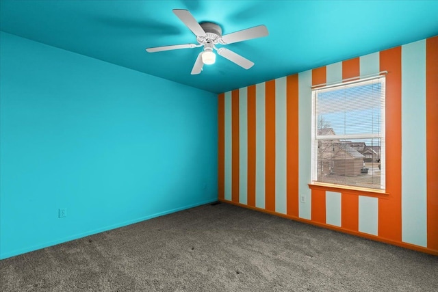 carpeted empty room with ceiling fan