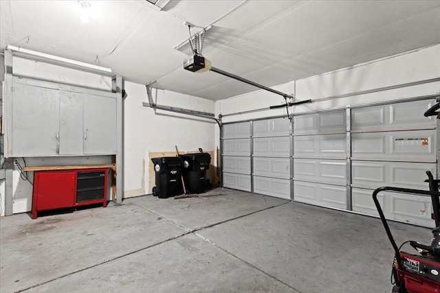 garage featuring a garage door opener