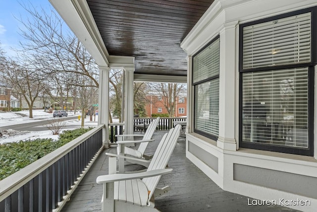 view of snow covered deck