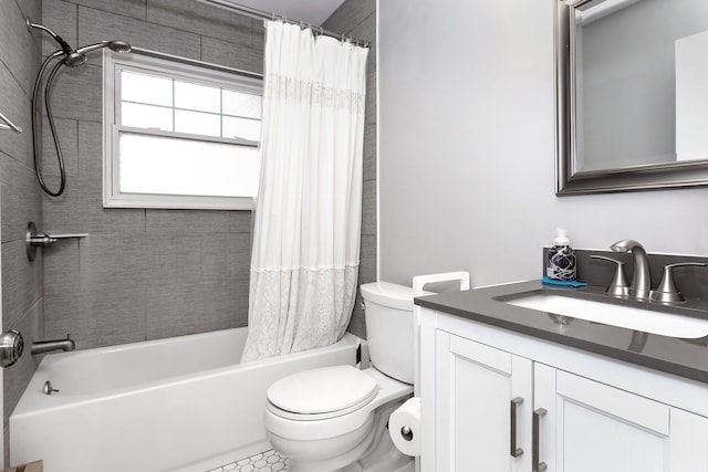 full bathroom with vanity, toilet, and shower / bath combo