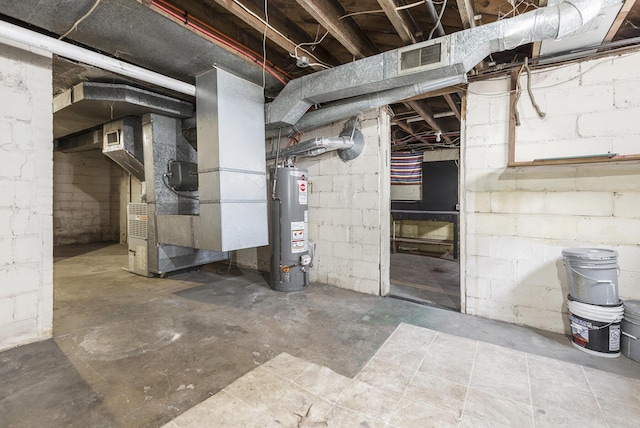 basement featuring gas water heater and heating unit