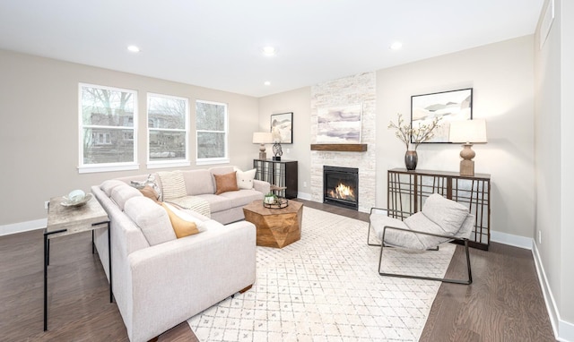 5090 Crandall Rd, Howell, MI 48855 - living room featuring wood finished floors, a fireplace, baseboards, and recessed lighting