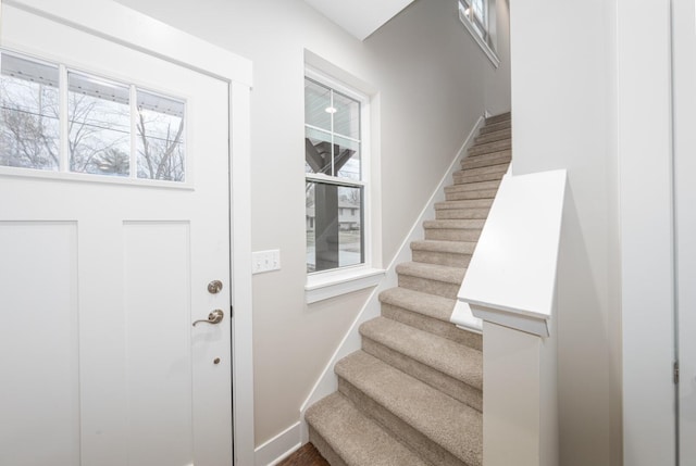 5090 Crandall Rd, Howell, MI 48855 - staircase with baseboards