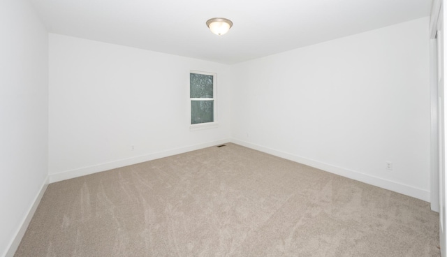 5090 Crandall Rd, Howell, MI 48855 - empty room featuring light colored carpet and baseboards