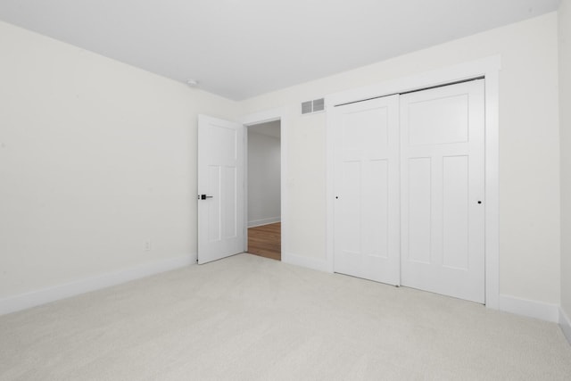 8200 Pine Ridge Ct, Northville, MI 48168 - unfurnished bedroom with carpet, baseboards, and a closet