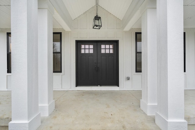 8200 Pine Ridge Ct, Northville, MI 48168 - property entrance with board and batten siding