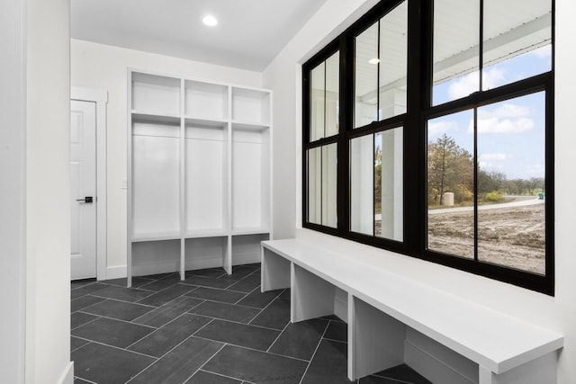 2735 Blue Bird Ln, Highland, MI 48357 - mudroom with recessed lighting and dark tile patterned floors