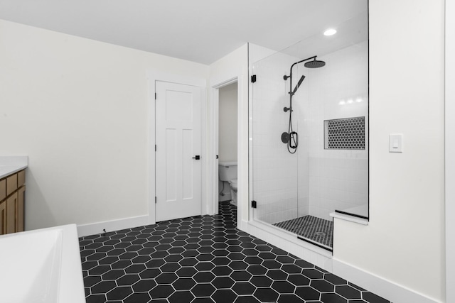 2735 Blue Bird Ln, Highland, MI 48357 - full bath with a shower stall, toilet, baseboards, vanity, and recessed lighting