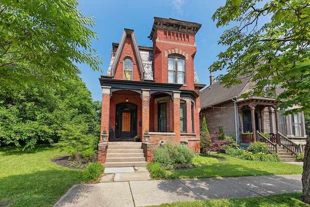 italianate home with a front yard