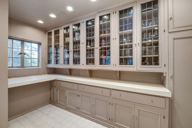 interior space featuring recessed lighting and tile patterned floors