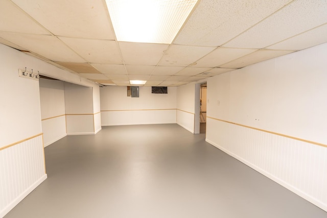 basement featuring a drop ceiling