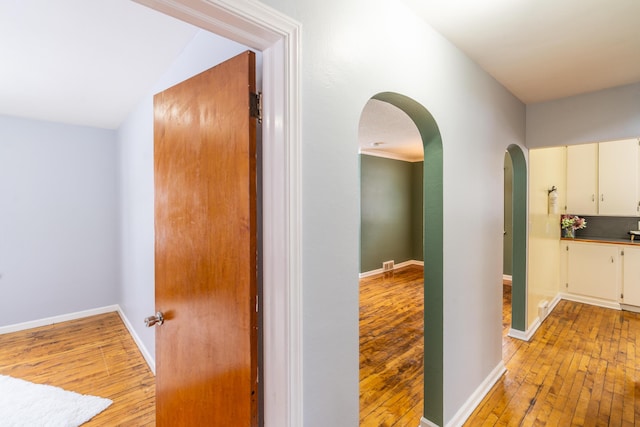 hall with light wood-type flooring