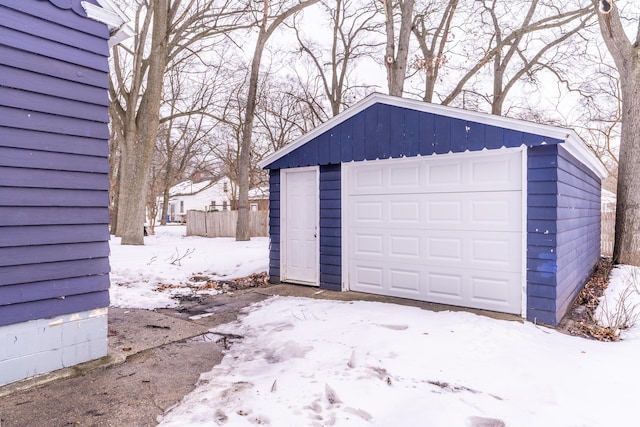 view of snow covered garage