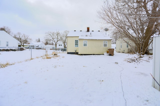 view of snow covered house