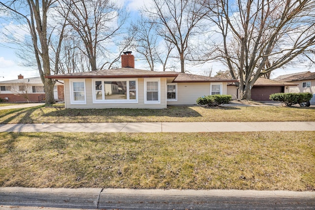 22810 E 13 Mile Rd, Saint Clair Shores, MI 48082 - ranch-style house featuring a chimney, a front yard, a garage, and driveway